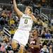 Michigan forward Zack Novak goes up for a layup. Angela J. Cesere | AnnArbor.com