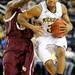 Alabama A&M guard Jeremy Crutcher, left, tries to block Michigan guard Trey Burke. Angela J. Cesere | AnnArbor.com