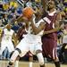 Alabama A&M guard Casey Cantey, right, tries to block Michigan guard Tim Hardaway Jr. from making a shot. Angela J. Cesere | AnnArbor.com