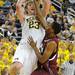 Alabama A&M guard Reginald Martin, right, tries to block a shot by Michigan forward Evan Smotrycz. Angela J. Cesere | AnnArbor.com