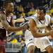 Michigan guard Eso Akunne, right, tries to keep the ball away from Alabama A&M guard Casey Cantey. Angela J. Cesere | AnnArbor.com