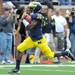 Michigan junior quarterback Denard Robinson runs the ball during the football game against San Diego State at Michigan Stadium on Sept. 24, 2011. Angela J. Cesere | AnnArbor.com