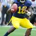 Michigan junior quarterback Denard Robinson looks for a pass during the football game against San Diego State at Michigan Stadium on Sept. 24, 2011. Angela J. Cesere | AnnArbor.com