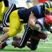 Michigan senior defensive end Ryan Van Bergen tackles San Diego State defensive back Leon McFadden during the football game at Michigan Stadium on Sept. 24, 2011. Angela J. Cesere | AnnArbor.com