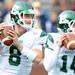 Eastern Michigan quarter back Alex Gillett, left, and quarter back Mark Iannotti practice before the football game against Michigan at Michigan Stadium on Saturday. Angela J. Cesere | AnnArbor.com