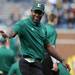 Eastern Michigan head football coach Ron English waves before the football game against Michigan at Michigan Stadium on Saturday. Angela J. Cesere | AnnArbor.com