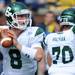 Eastern Michigan quarter back Alex Gillett looks for a pass during the football game against Michigan at Michigan Stadium on Saturday. Angela J. Cesere | AnnArbor.com