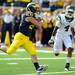 Eastern Michigan defensive back Marlon Pollard watches as Michigan sophomore wide reciever Drew Dileo scores a touchdown during the football game at Michigan Stadium on Saturday. Angela J. Cesere | AnnArbor.com