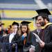 University of Michigan masters student Scott Tsuchiyama processes into Michigan Stadium for the class of 2012 commencement ceremony. Angela J. Cesere | AnnArbor.com