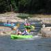 From bottom to top: Ann Arbor residents Masaki Ito, age 9, goes down the Argo Cascades in a kayak with his mom, Kayo, while his sister Maray, age 9, and father, Fumito, follow in their own kayak.  Angela J. Cesere | AnnArbor.com 
