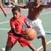 15-year-old Ypsilanti resident Aundre Smith, right, tries to block 15-year-old West Willow resident Ted Washington during a three-on-three basketball tournament.  Angela J. Cesere | AnnArbor.com 