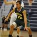 Saline's Caleb Luckett, top, guards Huron's Mike Lewis. Angela J. Cesere | AnnArbor.com