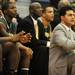Huron head coach Waleed Samaha, right, watches the game from the bench. Angela J. Cesere | AnnArbor.com