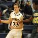 Huron's Demetrius Sims, right, tries to block Saline's Michael Hendrickson. Angela J. Cesere | AnnArbor.com