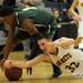 Saline's Andre Bond, left, and Saline's Garrett Stark scramble for the ball. Angela J. Cesere | AnnArbor.com