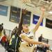 Huron's Yante Jackson, left, tries to block a shot by Saline's K.C. Borseth. Angela J. Cesere | AnnArbor.com