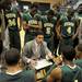 Huron head coach Waleed Samaha talks to his team during a time-out. Angela J. Cesere | AnnArbor.com