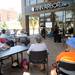 People gathered on the patio to listen to the music of Bill Edwards  during the AnnArbor.com Summer Concert Series on Friday afternoon. Angela J. Cesere | AnnArbor.com 