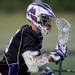 Pioneer's Dylan Swanson carries the ball down the field during the MHSAA lacrosse semi-finals game against Holt at Parker Stadium in Howell, Mich. on Wednesday evening. Angela J. Cesere | AnnArbor.com