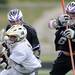 Pioneer's Louis Marr, top left, and Zachary Delph, right, throw Holt's Paul Schalau off balance during the MHSAA lacrosse semi-finals game at Parker Stadium in Howell, Mich. on Wednesday evening. Angela J. Cesere | AnnArbor.com