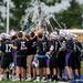 Pioneer teammates put their sticks up after a time-out during the MHSAA lacrosse semi-finals game against Holt at Parker Stadium in Howell, Mich. on Wednesday evening. Angela J. Cesere | AnnArbor.com
