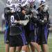 Pioneer teammates congratulate Peter Burke after he scored a goal during the MHSAA lacrosse semi-finals game against Holt at Parker Stadium in Howell, Mich. on Wednesday evening. Angela J. Cesere | AnnArbor.com