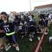 Pioneer teammates celebrate after Dylan Swanson scored the game winning double overtime goal at the MHSAA lacrosse semi-finals game against Holt at Parker Stadium in Howell, Mich. on Wednesday evening. Angela J. Cesere | AnnArbor.com