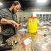 Adventures in Homebrewing employee Aaron Manning assembles gas line disconnects for home kegging systems inside the store in Ann Arbor on Sept. 12, 2011. Angela J. Cesere | AnnArbor.com
