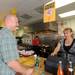 Chela's co-owner Lori Iraola, right, rings up an order for Ann Arbor resident Bruce Scott. Angela J. Cesere | AnnArbor.com 