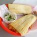 Chela's pork tamales with sour cream and salsa. Angela J. Cesere | AnnArbor.com 