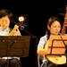 Ann Arbor Chinese Traditional Music Ensemble members Shelly Chang, right, and Chien Sze play the zhongruan during the Chinese New Year celebration. Angela J. Cesere | AnnArbor.com
