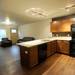 The first level kitchen and living room in another apartment at City Place. This apartment has space on the first floor and lower garden level. Angela J. Cesere | AnnArbor.com 