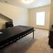 A bedroom inside of the third level unit, which shares a bathroom with another bedroom.  Angela J. Cesere | AnnArbor.com 
