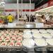 People walk through the food aisles during the Costco grand opening in  Ann Arbor on Friday morning. Angela J. Cesere | AnnArbor.com