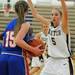 Dexter's Riley McDonald, right, tries to block Lincoln Park's Paige Llanes from progressing down the court. Angela J. Cesere | AnnArbor.com