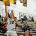 Lincoln Park's Ashley Majka, right, watches as Dexter's Olivia Cares goes up for a layup. Angela J. Cesere | AnnArbor.com