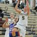 Dexter's Riley McDonald jumps up for a shot. Angela J. Cesere | AnnArbor.com