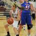 Dexter's Polly Washabaugh dribbles around Lincoln Park's Becky Simison. Angela J. Cesere | AnnArbor.com