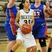 Lincoln Park's Ashley Majka, left, and Becky Simison, right, try to block Dexter's Teia McGahey. Angela J. Cesere | AnnArbor.com