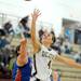 Lincoln Park's Becky Simison, left, knocks the ball out of Dexter's Makenzie Svihra as she jumps for a shot. Angela J. Cesere | AnnArbor.com