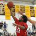 Dexter's Michael Mioduszewski, right, tries to block a shot by Willow Run's NyShaun Marks. Angela J. Cesere | AnnArbor.com