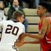 Willow Run's Jamal Poplar, right, tries to grab the ball from Dexter's Jacob VanHoof. Angela J. Cesere | AnnArbor.com