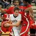 Dexter's Brandon Bellottie, left, tries to get by Willow Run's Kareen Lovelace Jr. Angela J. Cesere | AnnArbor.com