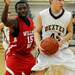 Willow Run's Johnny Brown tries to block in Dexter's Brandon Bednarz. Angela J. Cesere | AnnArbor.com
