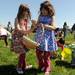 Ann Arbor residents Ella-Sophia Hawley, age 5, right, and Olivia Callanan, age 6, pick up plastic eggs during the egg scramble at Ann Arbor Jaycees Spring Eggstravaganza at Southeast Area Park in Pittsfield Township. Angela J. Cesere | AnnArbor.com