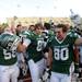EMU teammates celebrate their 30 - 17 victory over Buffalo. Angela J. Cesere | AnnArbor.com
