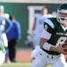 Eastern Michigan quarter back Alex Gillett looks for an opening. Angela J. Cesere | AnnArbor.com