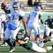 Eastern Michigan linebacker Justin Cudworth sacks Buffalo quarter back Chazz Anderson. Angela J. Cesere | AnnArbor.com