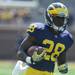 Sophomore running back Fitzgerald Toussaint runs the ball during practice at Michigan Stadium before the game against Western Michigan in Ann Arbor, Mich. on Sept. 3, 2011. Angela J. Cesere | AnnArbor.com