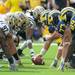 Western Michigan and Michigan line up at the line of scrimmage during the football game at Michigan Stadium in Ann Arbor, Mich. on Sept. 3, 2011. Angela J. Cesere | AnnArbor.com